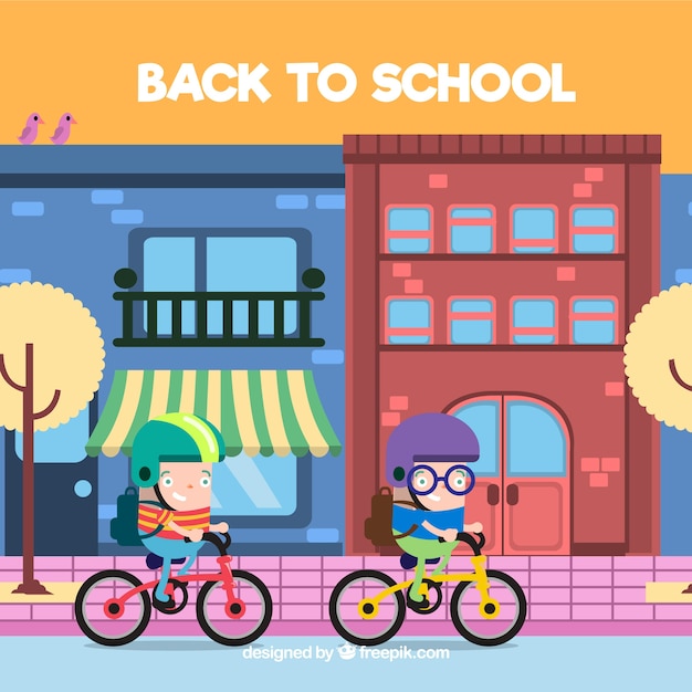 Дети ходят в школу на велосипеде