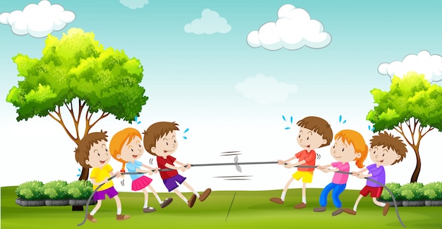Children play tug of war in the park