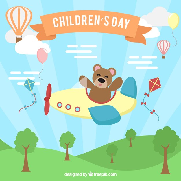 Childrens day concept with teddy flying a plane