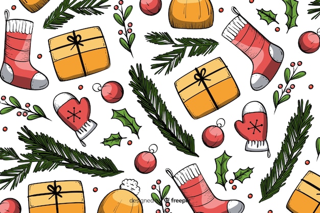 Free vector christmas background in hand drawn