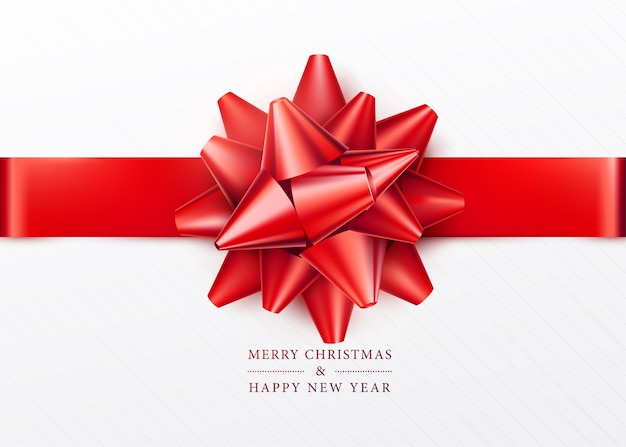 クリスマスの背景。赤いリボンとリボンが付いた白いギフトボックス。上面図。あいさつテキストサイン。メリークリスマスと新年あけましておめでとうございます。