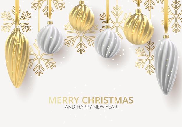 Christmas background with christmas tree toys of white and gold, a spiral balls and snowflakes on white horizontal background, with the inscription christmas.