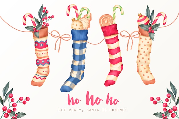 Free vector christmas background with winter socks and candies