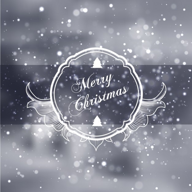 Free vector christmas badge on a blurred background