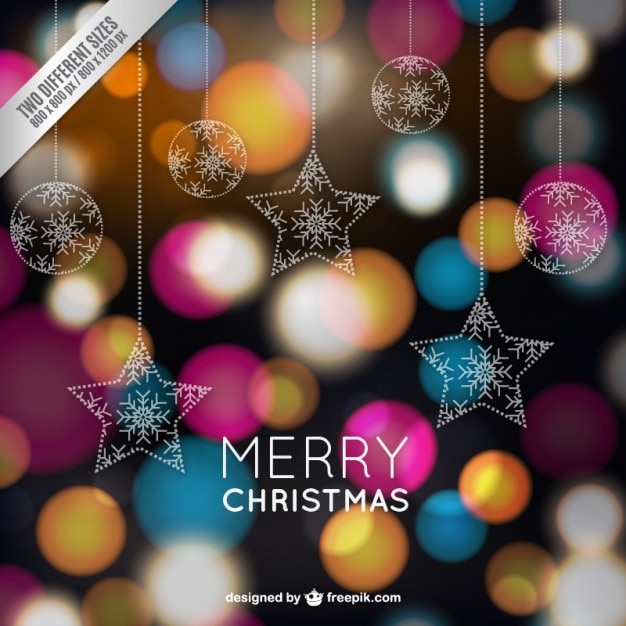 Free vector christmas card with colorful sparkles