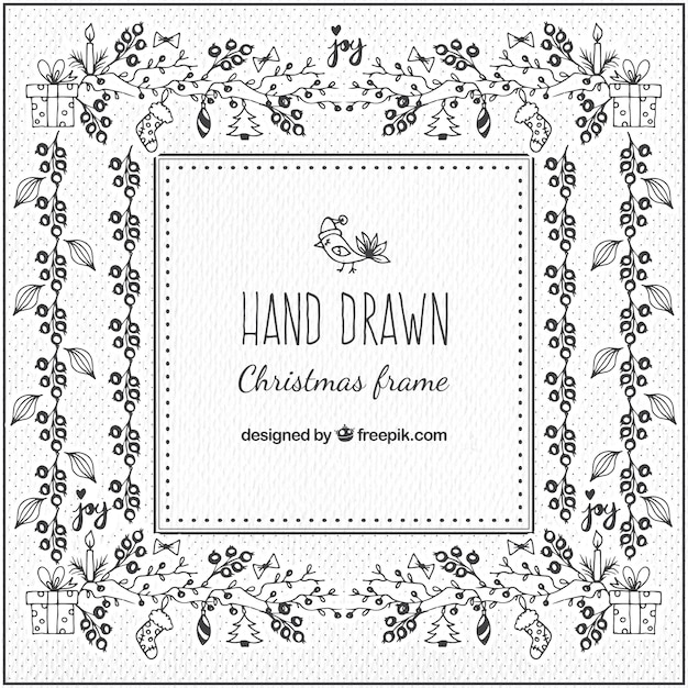 Free vector christmas frame with hand drawn floral ornaments