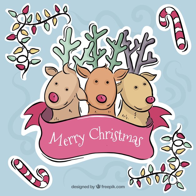 Christmas greeting with beautiful reindeer and hand-drawn ornaments