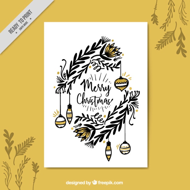 Free vector christmas greeting with hand drawn leaves and ornaments