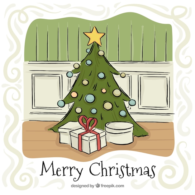 ツリーと手描きの贈り物クリスマスの挨拶