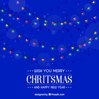 Free vector christmas lights on blue background