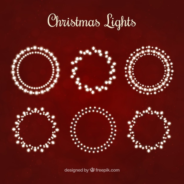 Бесплатное векторное изображение Рождественские огни коллекция
