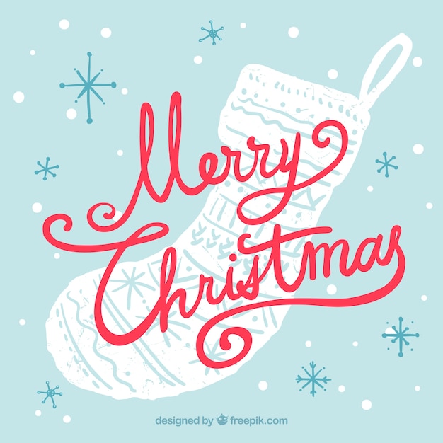 Free vector christmas sock background with handwritten lettering