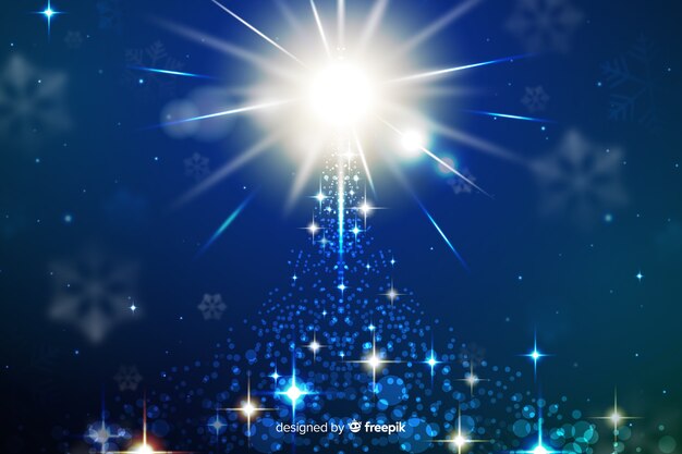 Christmas sparkling background on blue shades