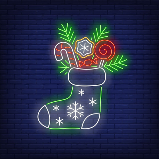 Free vector christmas stocking in neon style