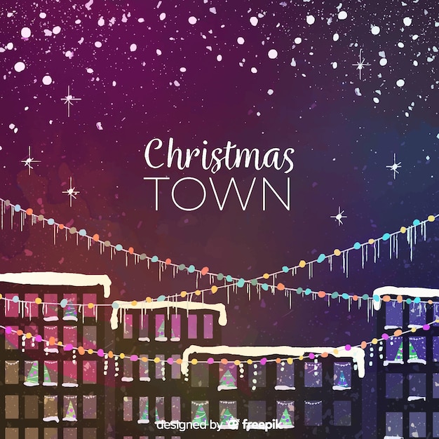 Free vector christmas town background with lights garlands