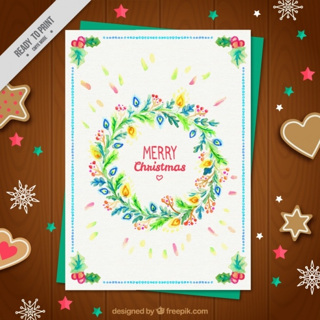 Free vector christmas wreath card and gingerbread cookies