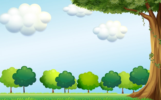 Vettore gratuito un cielo azzurro e gli alberi verdi