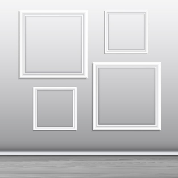 Collection of blank picture frames hanging on a wall