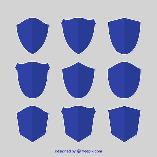 Collection of blue shields in flat design