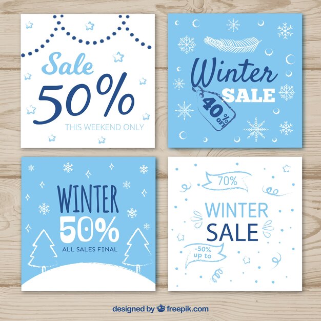 collection of blue and white winter sale cards