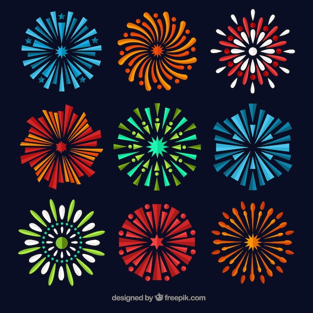 Raccolta di fuochi d'artificio colorati in disegno piatto