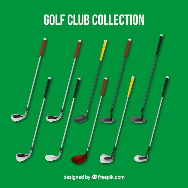 Collection of golf clubs on green background