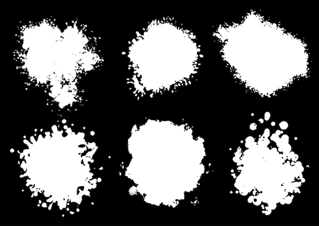 Collection of grunge style splatter designs white on black