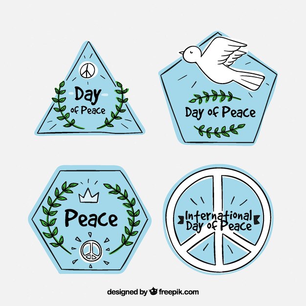 Free vector collection of hand drawn labels for day of peace