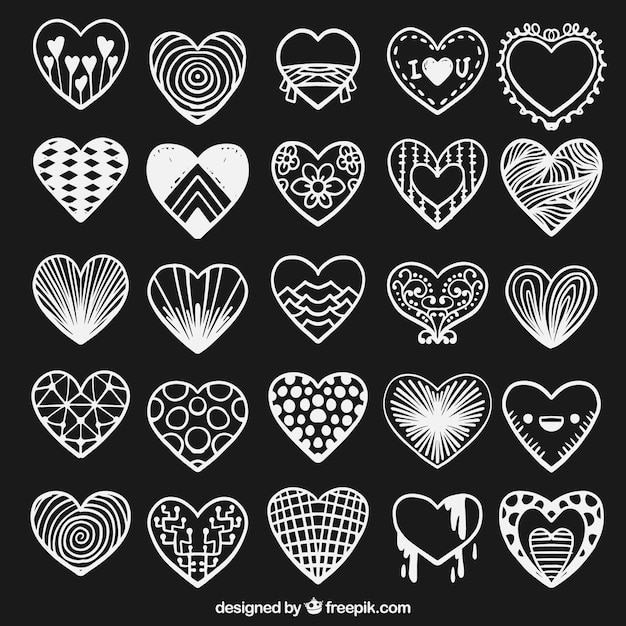 Collection of hand drawn white hearts 