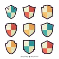 Free vector collection of heraldic shields in flat design