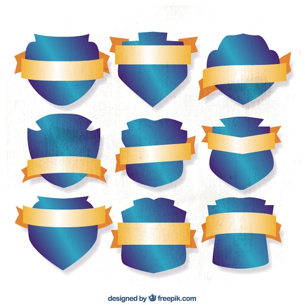 Бесплатное векторное изображение Коллекция синих щитов с золотыми лентами