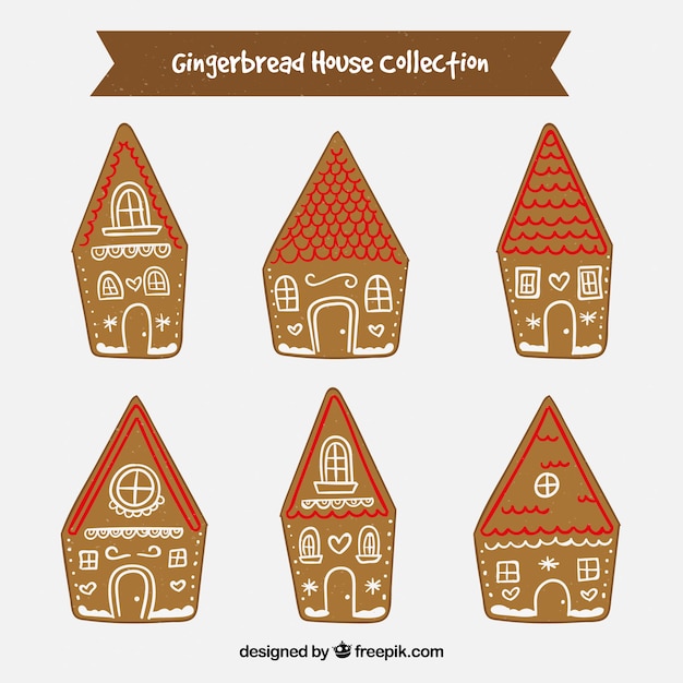 Collection of six gingerbread houses with red roofs