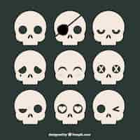 Free vector collection of skulls with expressions