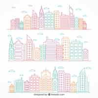 Free vector colored hand drawn modern cities set