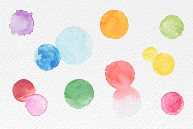 水彩のカラフルなスポットのセット 手描きデザインの芸術的なイラスト プレミアムベクター
