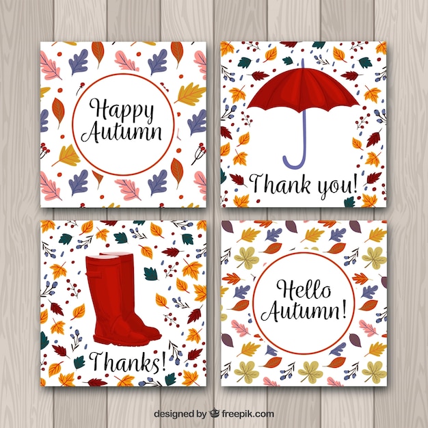 Vettore gratuito carte di autunno colorate con stile disegnato a mano