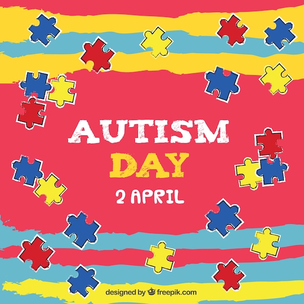 Colorful background with colored puzzle pieces for autism day