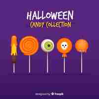 Vettore gratuito collezione di caramelle di halloween colorato con design piatto
