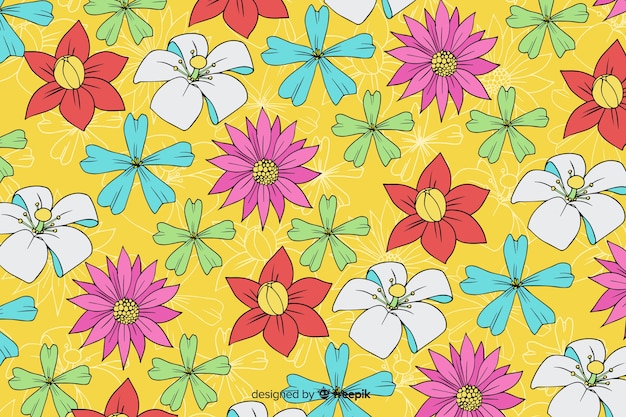 Free vector colorful hand drawn floral background