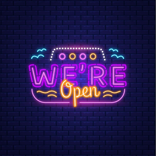 Colorful neon 'we are open' sign