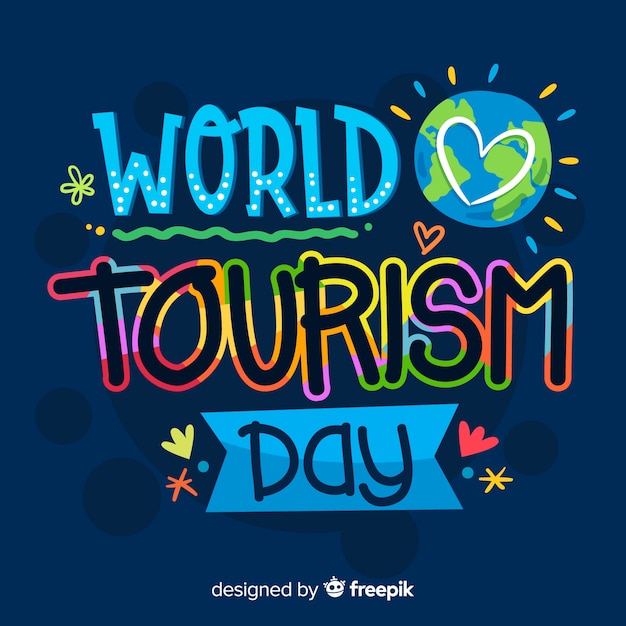 Colorful world tourism day lettering background