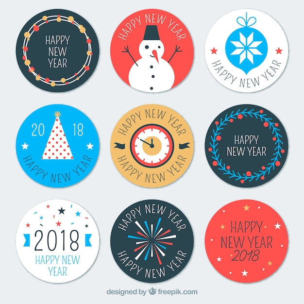 Free vector colourful round new year badges