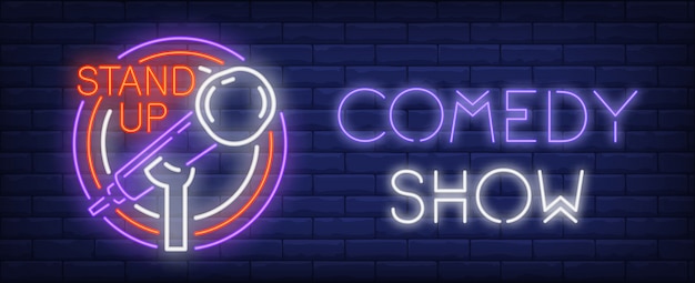 Free vector comedy show neon sign. microphone on stand in colorful circles.