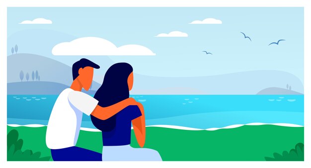 Couple sitting on beach