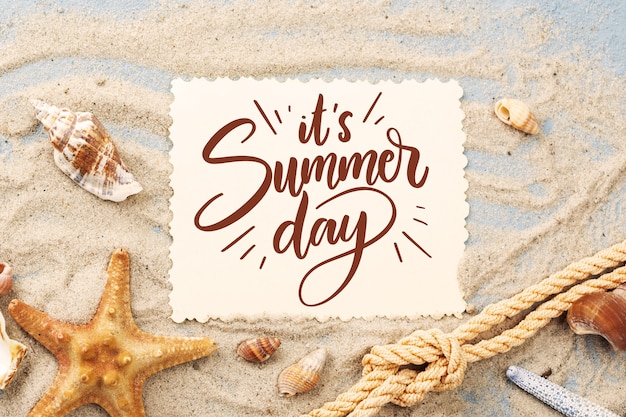 Free vector creative summer lettering with photo of sand