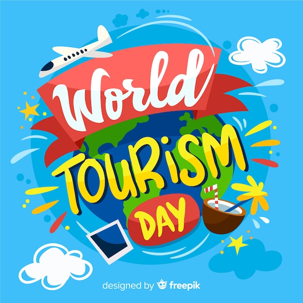 Creative world tourism day lettering background