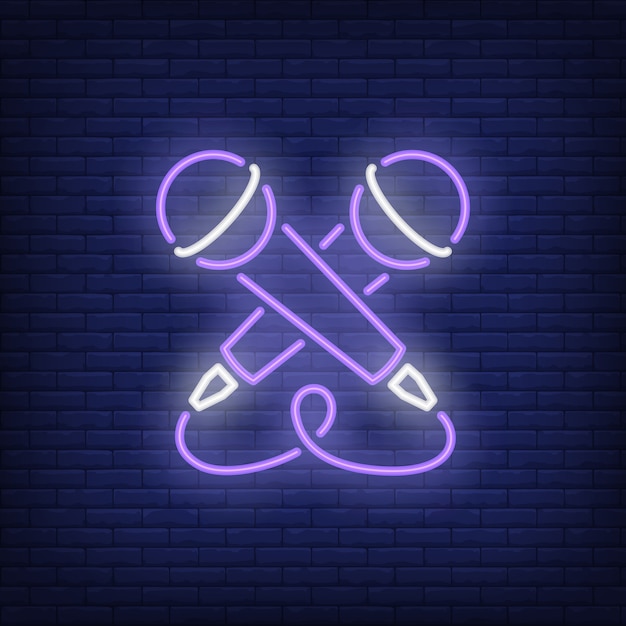 Crossed microphones neon sign