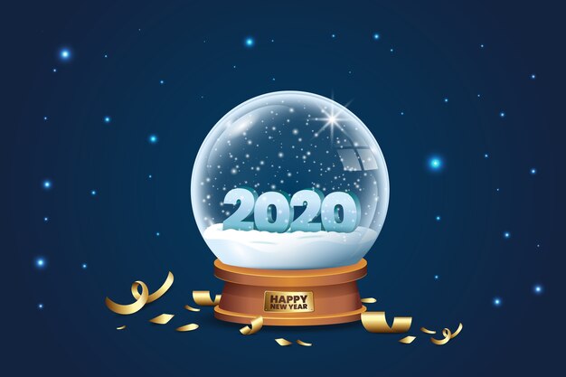 Crystal globe with snow and confetti for 2020 new year