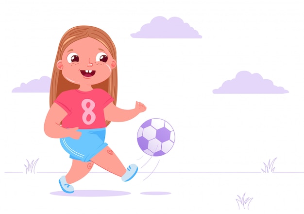 Cute baby girl playing football outside on grass with a soccer ball. 