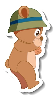 帽子​の​ステッカー​の​側面図​を​身​に​着けている​かわいい​クマ​の​漫画